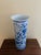 A gorgeous Chinoiserie blue and white porcelain umbrella or cane stand with Asian floral designs China, Late 20th Century...