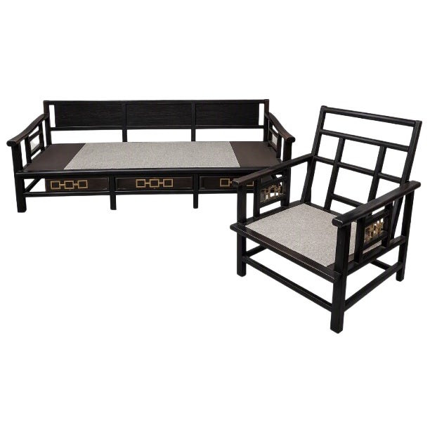 A striking and rare 1950s Asian Modern sofa and lounge chair in the style of James Mont, featuring dramatic black faux-...