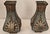 This matching pair of antique toleware vases features softly waisted forms with flared rims, hand-decorated with romantic...