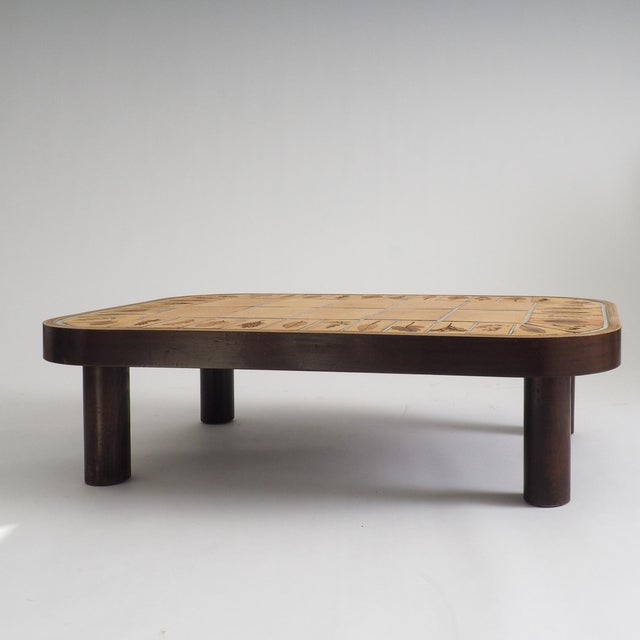 Own a piece of French design history with this authentic coffee table by the renowned master ceramicist Roger Capron....