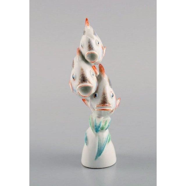 Willi Münch-Khe (1885-1960) for Meissen. Art Deco figure in hand-painted porcelain. Three fish. 1930s. Measures: 12 x 6.3...