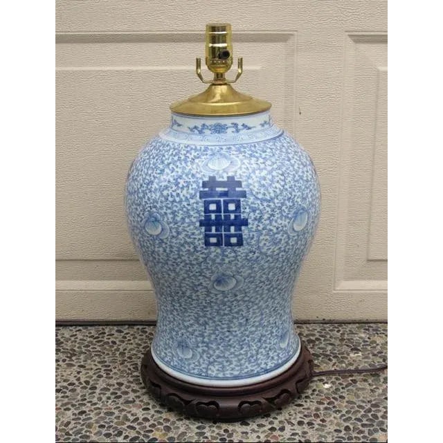 Chinese blue and white porcelain temple jar, c.1920’s Having a large bulbous body decorated in blue and white scrolls....