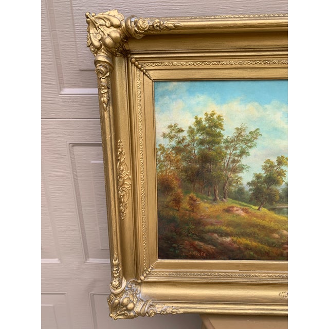 A beautifully atmospheric mid-19th century landscape painting attributed to Alexander F. Rolfe, signed "A. Rolfe" at lower...