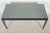 A sleek contemporary coffee table by renowned Italian manufacturer B&B Italia. This refined design features a substantial...