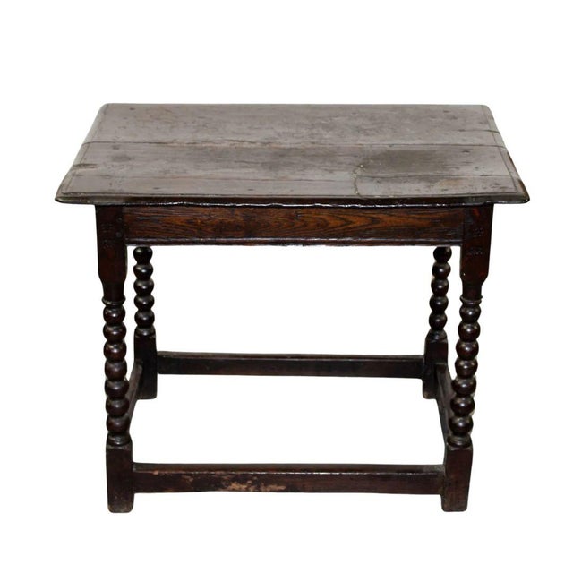This charming 19th-century Welsh side table, crafted from solid oak, showcases traditional design and quality...
