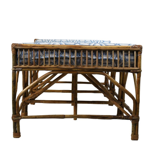 A stunning statement piece — this fretwork bamboo bench offers the versatility of a daybed with the elegance of fine...