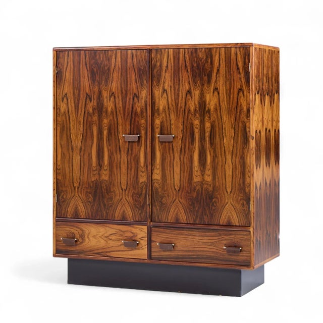 Westnofa Mid Century Danish Rosewood Armoire This armoire measures: 42 wide x 18 deep x 47.5 inches high Restored - Mint...