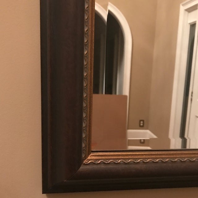 Custom Solid Wood Framed Beveled Mirror with Gold Accents. Substantial in weight. Depth is 2 1/2”. Mirror could be hung...
