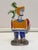 De Simone Italian pottery piece featuring a knight, shield, and sword reflects the vibrant, Picasso-inspired folk art...