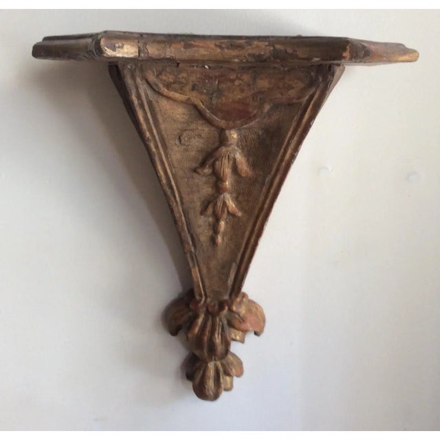 Very rare and unusual antique Giltwood bracket Shelf . It looks great with a sea fan and a few shells or antique santos doll.