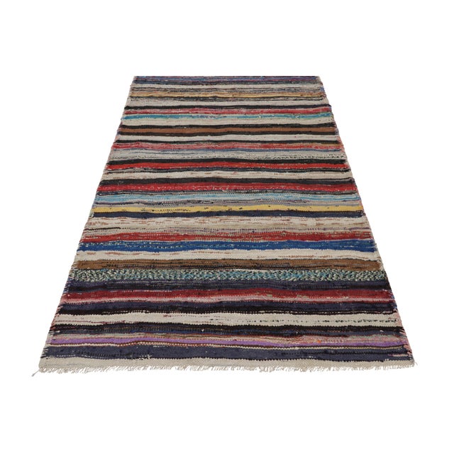 Made with handwoven wool circa 1950-1960, this 4x8 vintage Shahsavan Kilim Runner is a particularly bright and sought-...