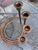 This lovely set of brass candle holders are a beautiful example of minimalist 1960's brass decor. The candle holders swirl...