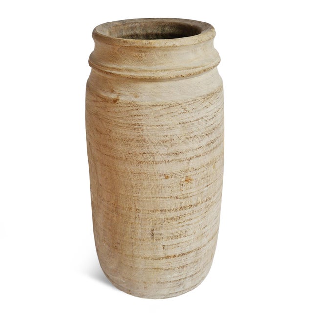 Hand-carved from solid wood in rural India, these antique lassi pots were originally used for storing and churning...