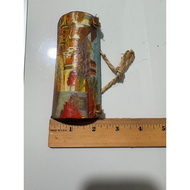 A Rare Miniature Masterpiece This exquisite 5”x2” hand-painted roof tile captures the vast beauty of a colonial village in...