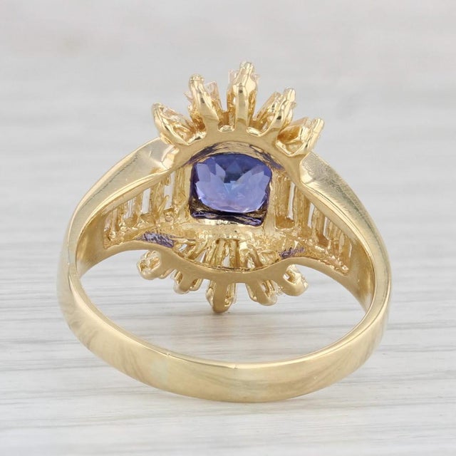 Gemstone Information: - Natural Tanzanite - Carats - 0.75ct Cut - Cushion Color - Purple / Blue Treatment - Heated -...