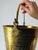 Originally used as a water bucket (we think!), this vintage brass bucket is detailed with an elegant etched pattern and...