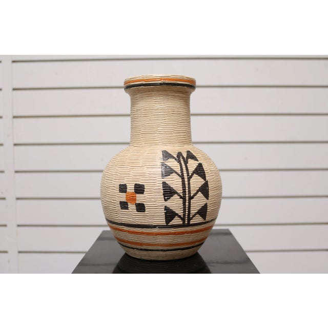 Handmade vase, from Berkeley House - Italy, with black and orange design. The piece is signed by Patty Haskamp. Top and...