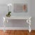 Stunning hand carved wood wall mount console table by Gampel Stoll featuring a fretwork border and decorative elephant...