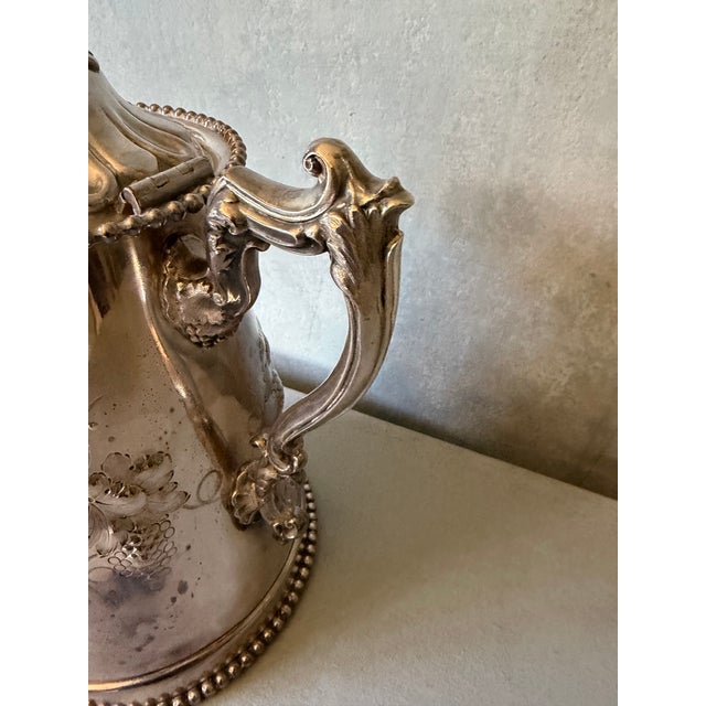 Beautiful ornate 19th century large silver plated pitcher. Lovely engraving and beading.