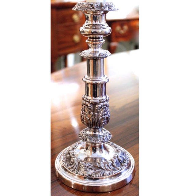 A lovely pair of English Georgian acanthus encrusted silver on copper candlesticks, ca. 1820-1830, retaining their...