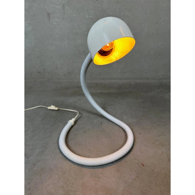 Vintage 'snake' lamp, based on a design by the Japanese designer Isao Hosoe from the 1970s. A timeless design classic. The...