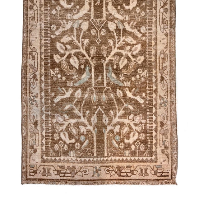 A very interesting design of birds flying around adds a lot of charm and character to this piece. Rugs from Malayer, east...