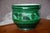 This piece has a truly unique character and undeniable presence! This glazed ceramic cachepot, dating from the mid-20th...