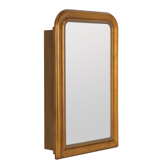 The Sepik Medicine Cabinet pairs a warm gold resin frame with a graceful arched silhouette, elevating everyday bathroom...