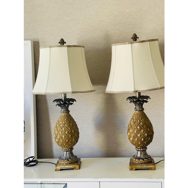 Great pair of Hollywood Regency style large table lamps with silvered gold finish and custom made linen shades from Boca...