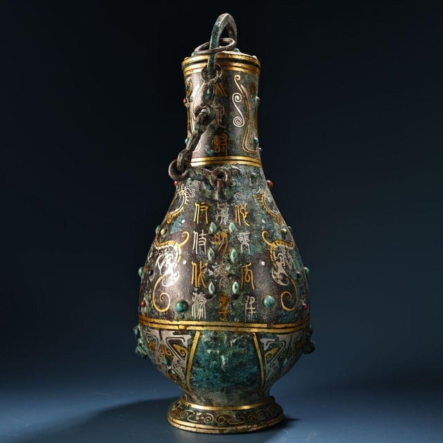 This is a truly magnificent and highly collectible piece of vintage Chinese bronze artistry. This elaborately decorated...