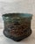 Beautiful antique carved hand made art pottery with a scalloped edge, wonderful glazing and texture and muted green and...