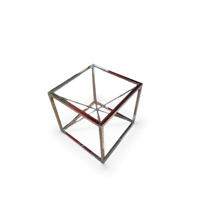 This dynamic end table by Vanguard is a chrome cube with rods extending from each corner into the center to create a Pop...