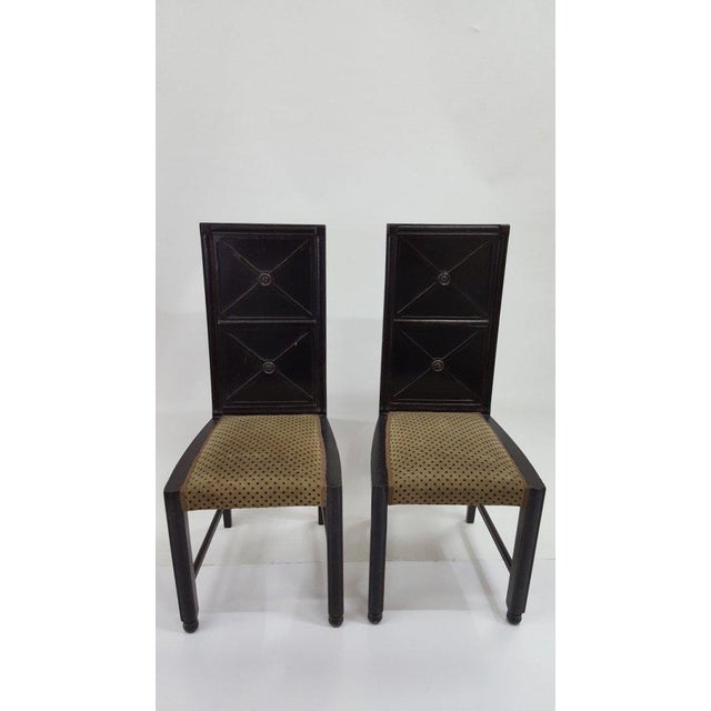 These wooden chairs feature black painted finish, high quality woodwork and Backhausen fabric- They were made at the turn...