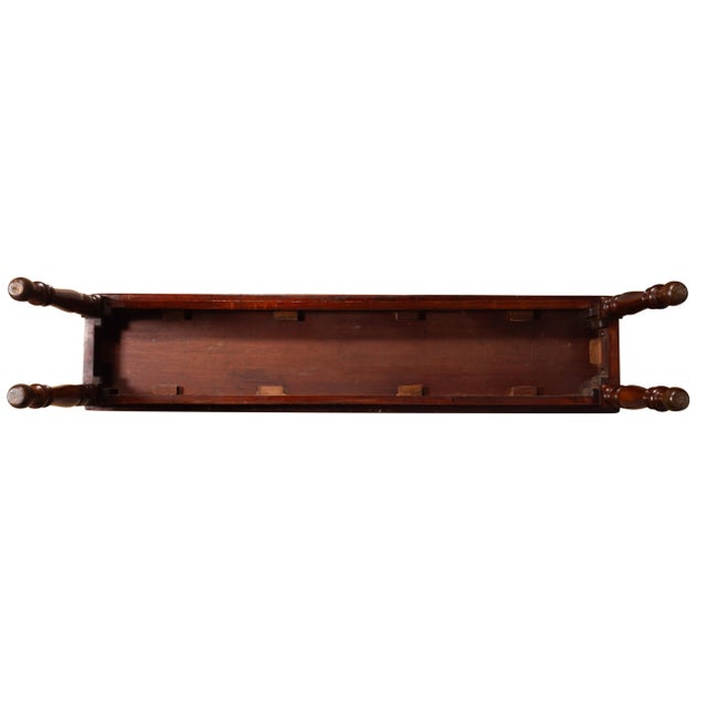 Original and of the period. Hard to find longer length. Rectangular top with turned cylindrical hand holds. Raised on...