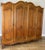 Vintage French Louis XVI Style Carved 4-Door Armoire For Sale - Image 9 of 15