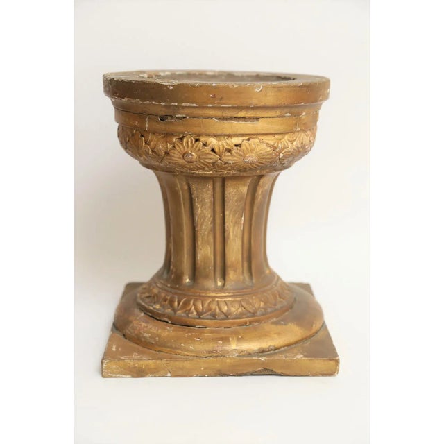 A large pair of antique 19th-Century French carved and giltwood and gesso altar candle stands. They are Neoclassical forms...