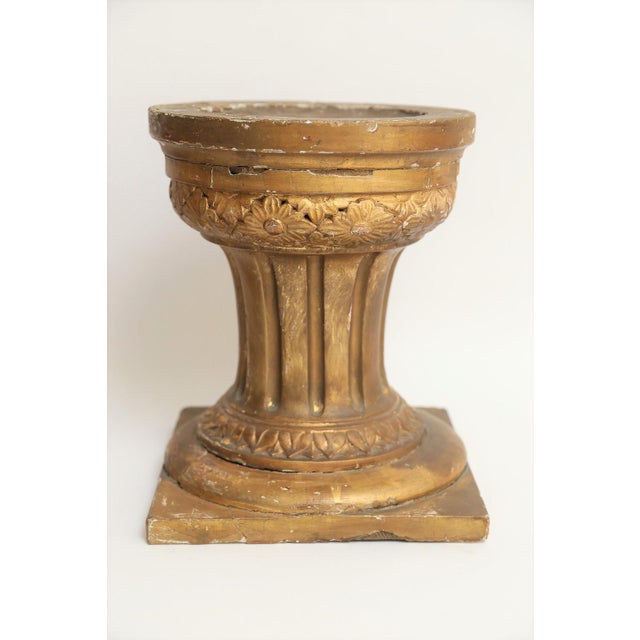 A large pair of antique 19th-Century French carved and giltwood and gesso altar candle stands. They are Neoclassical forms...