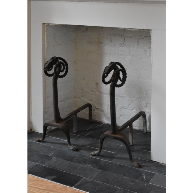 Antique Wrought Iron Figural Ram Andirons, A Pair, Circa Early 20th Century. Sculptural iron forms with coiled horns,...