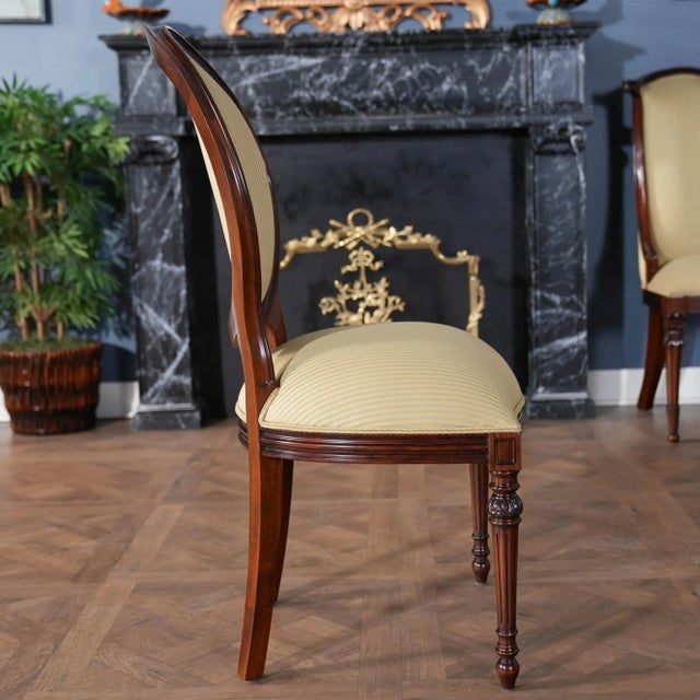 The Round Back Mahogany Side Chair by Niagara Furniture. These high quality dining chairs are hand made from kiln dried...