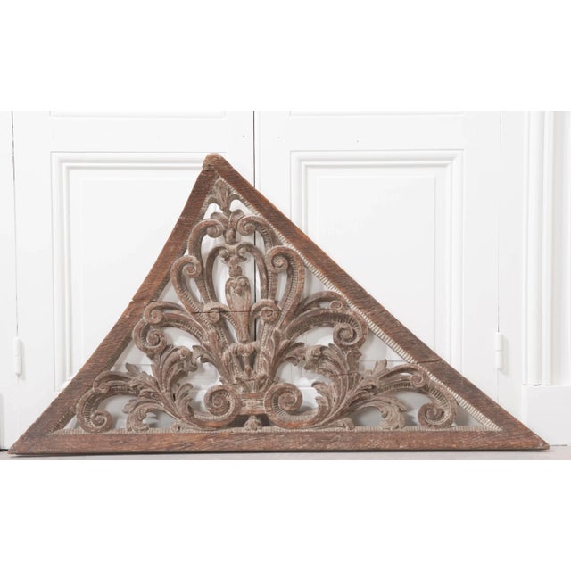 A masterfully carved stairwell ornament from the early part of the 18th century, Sweden. Dating to 1730, this curved...