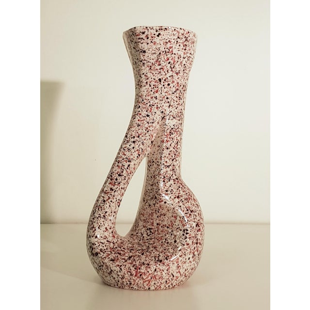 Two sculptural vases and an ashtray by Roberto Rigon with unusual decor, probably from the 1980s. Very dynamic and...