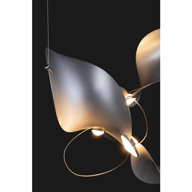 The wide, undulating curves of large sand dunes inspired us to create the modular Dune light fixture. Fascinated by the...