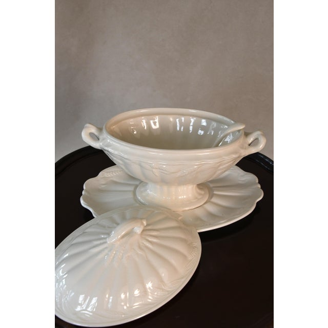 complete with a basin, lid, serving plate, and ladle. Ironstone became widely favored in 19th century England for its...