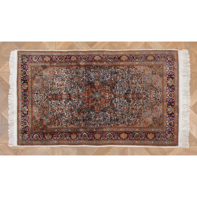A hand-knotted Middle Eastern rug from the famous Ghom region is a demonstration of precise craftsmanship and high quality...