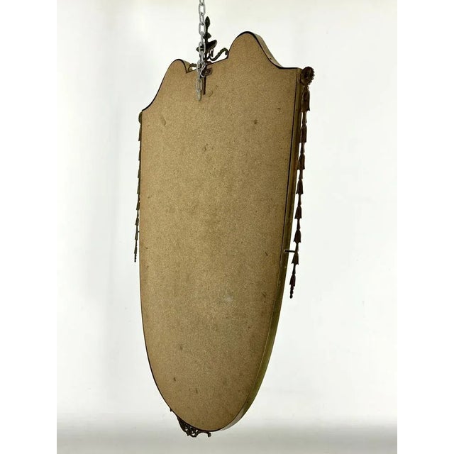 Good vintage condition with normal trace of age and use for this vintage mirror made from brass. Produced in Italy during...