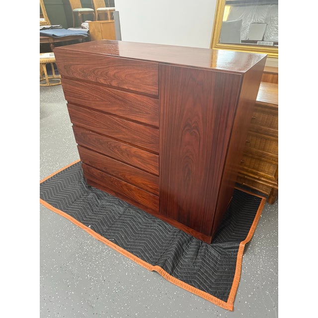 A rosewood gentleman’s chest by Arne Wahl Iversen for Vinde Mobelfabrik, Denmark. It features beautiful rosewood grain,...