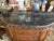 Vintage walnut demilune cabinet/sideboard, with Black marble top. 6 drawers with two side cabinets. Brass hardware.