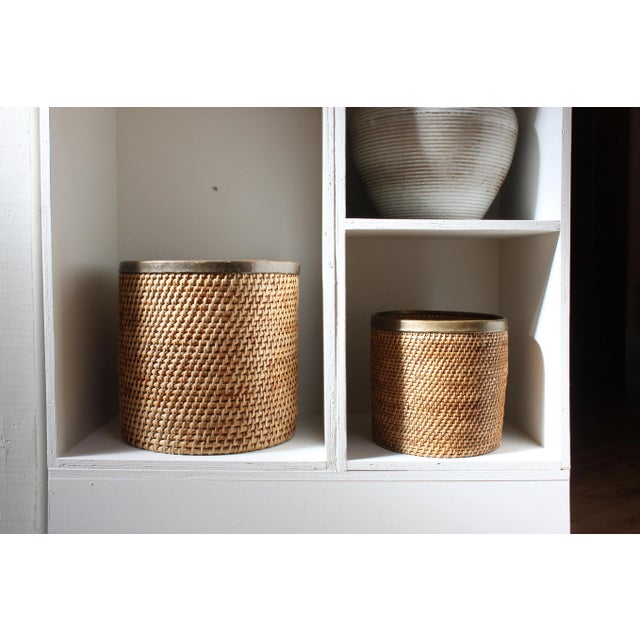 Italian brass and rattan baskets. Rigid and tightly formed. Heavy for their size. Use as catch-alls, planters, paper waste...