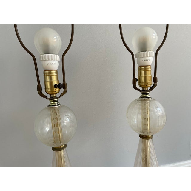 Pair of Elegant 1940's Hollywood Regency MCM Etched and Cut Glass Lamps 21.5" to socket, 31" to top of finial; base is...