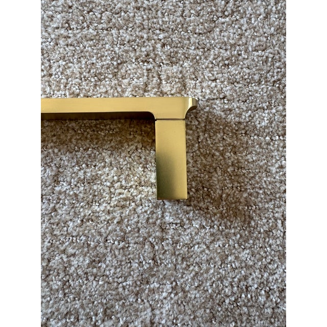 Rejuvenation Towel bar in Aged Brass. With clean lines and a rounded silhouette, Bowman offers a contemporary accent for...